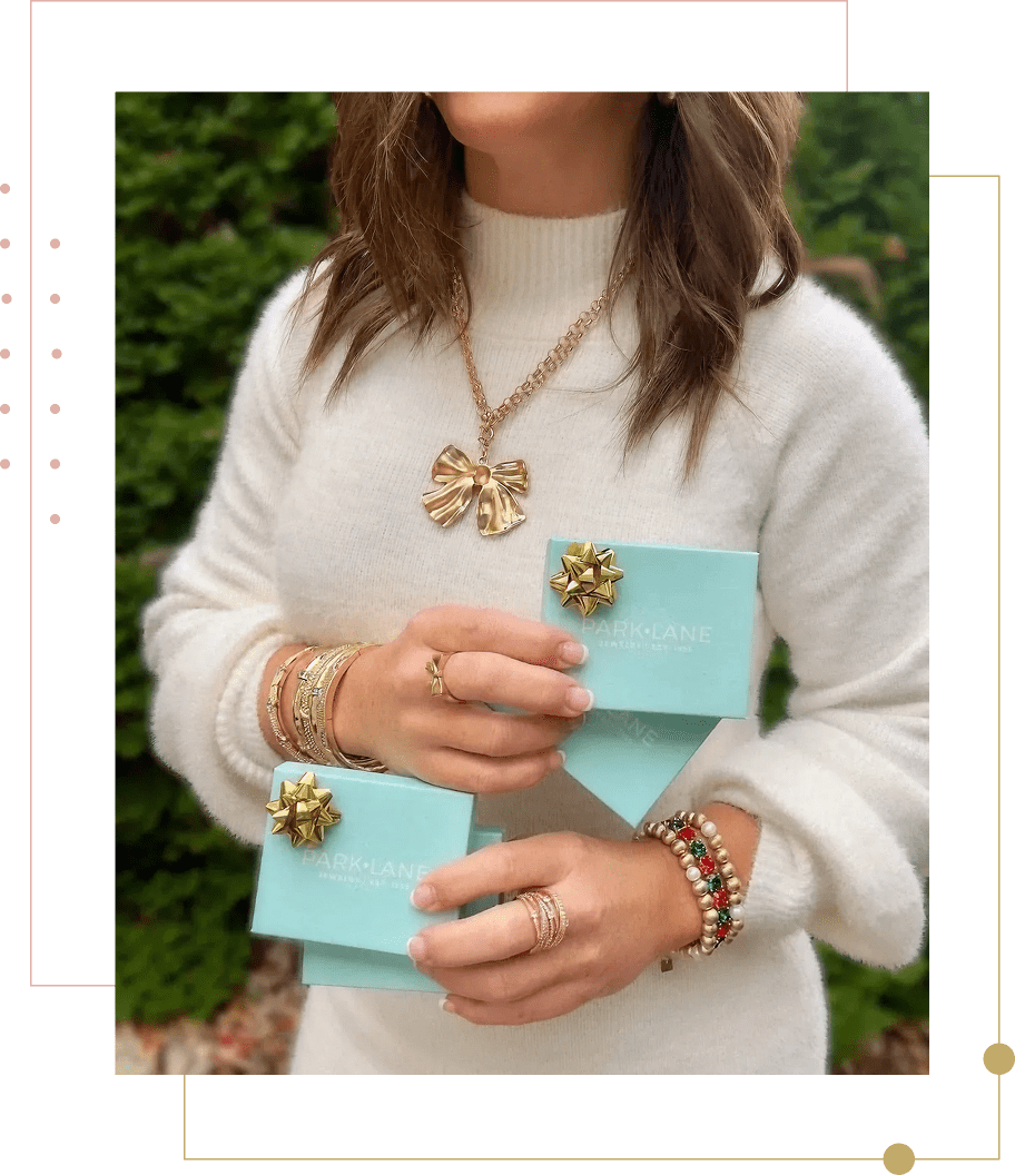 Fashionable gifts with gold bows in hands